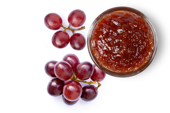 Grape jam in glass jar 